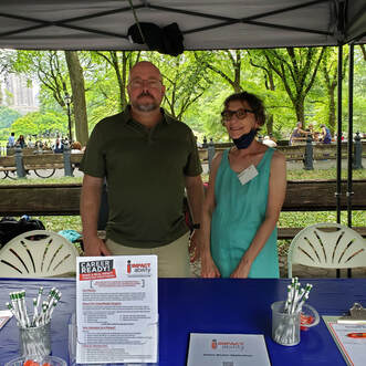 Pictured Left to Right: Board Member Craig Weitzel and Newsletter Editor Michelle Bisson at the Disability Unite Festival July 2022