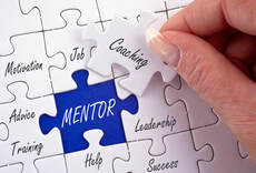 Jigsaw puzzle words describing the qualities of a MENTOR